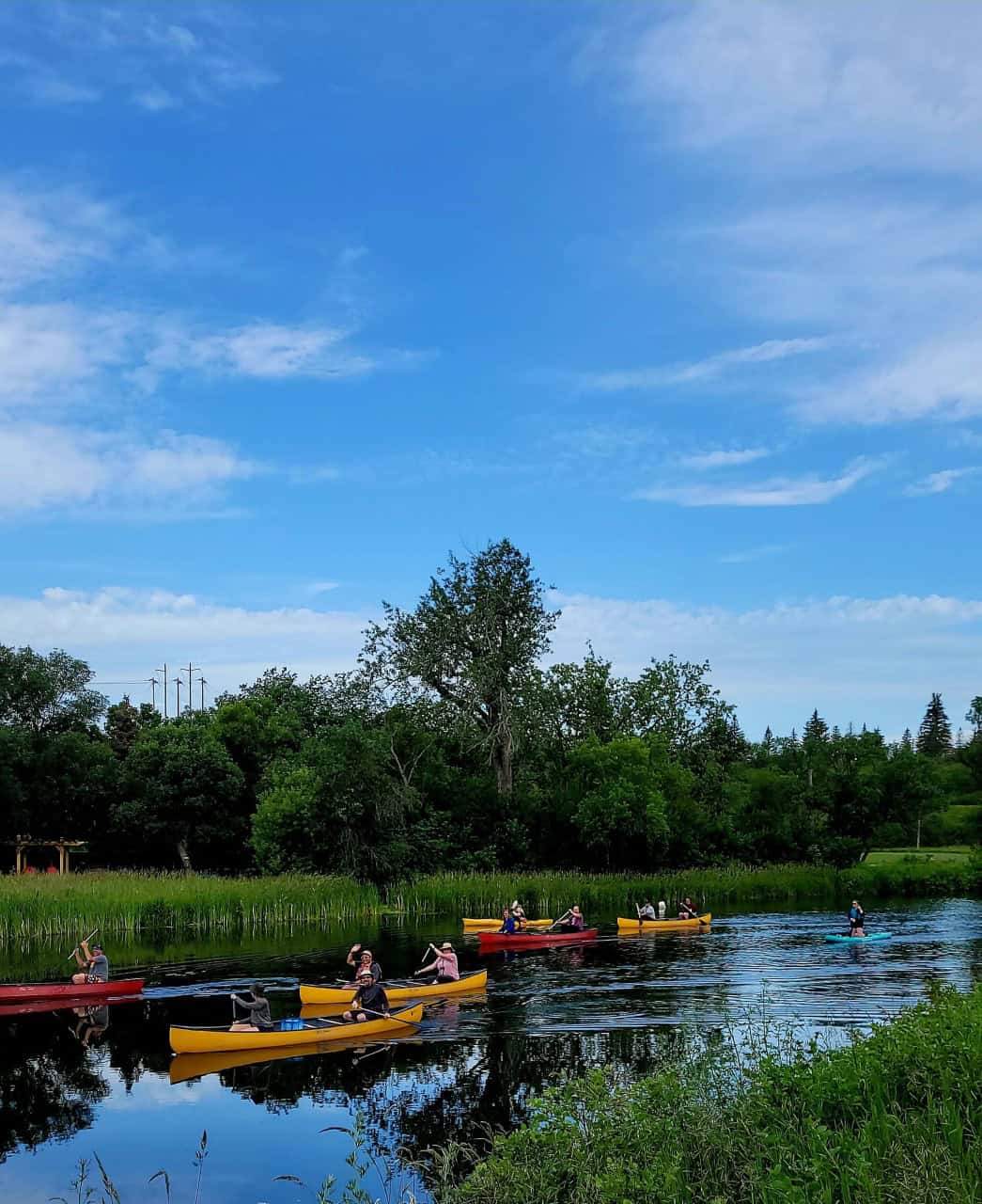 Adventure Seekers coming past Lorne Calvert Campground - Moose Jaw Saskatchewan - The Canada Adventure Seekers paddling past our campsite at the Lorne Calvert Campground. 
Moose Jaw, Saskatchewan