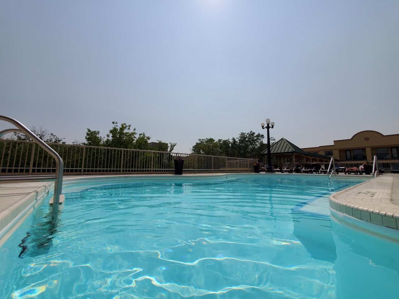 The Gorgeous Outdoor Pool Area in Moose Jaw  - Located on the rooftop of Temple Gardens Hotel, overlooking Cresent Park. This section of the pool is a bit hotter than inside. Don't forget your sunglasses if you plan on hanging out outside 