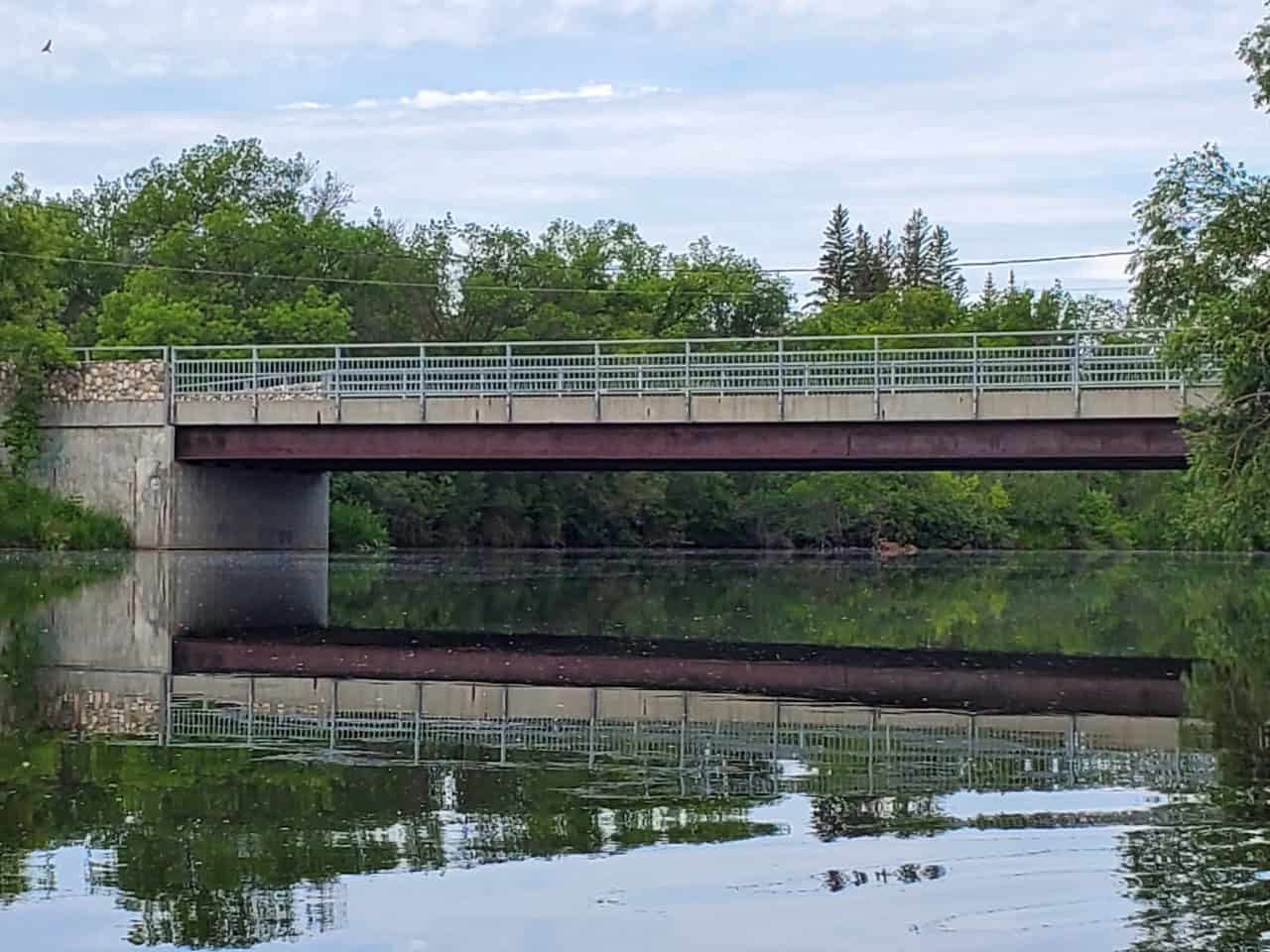 Awesome Water Reflections on the Calm River - The Moose Jaw River in the Wakamow Valley has next to no current and offers some stunning water reflection shots for photographers 