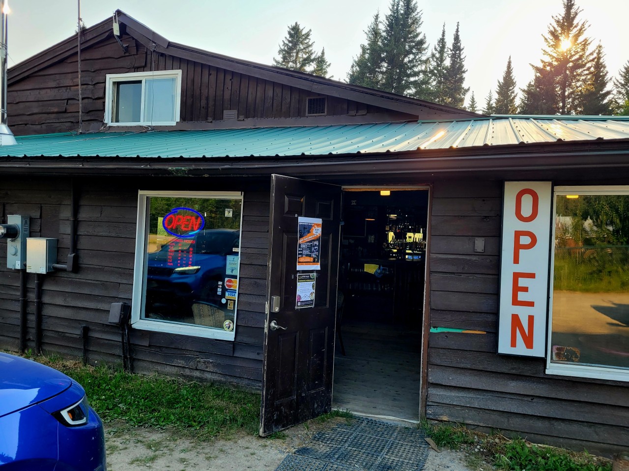 100 Year Old Bearberry Saloon Building - Sundre Alberta Canada - The log cabin that is home to the Bearberry Saloon was built in the early 1920s and has been serving patrons for over 80 years. Put the Bearberry Saloon on your destination list when visiting the Sundre, Alberta area.