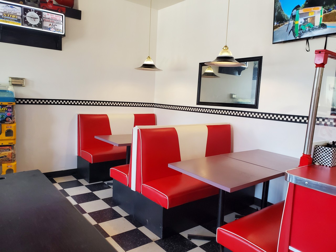 Booth Seating Available Burger Baron  - There are multiple seating options available at this Sundre diner. Pop up into one of these cute booths for an ice cream or a delicious burger 