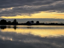 Looking across the Fraser River at Westham Island at sunset 2024-09-25