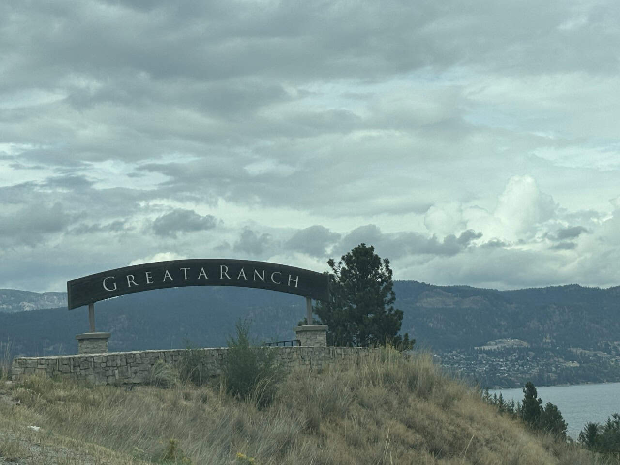 Greata Ranch, Fitzpatrick Vineyards in Peachland BC 2024-09-28 - On Hwy 97, north of Summerland, you'll see the sign for Greata Ranch. This is the start of the long driveway into the Fitzpatrick Vineyards, on Okanagan Lake..