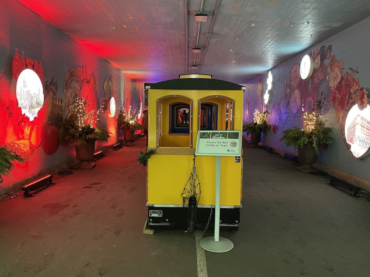 Winter Wonders Royal Botanical Gardens Train in Burlington Ontario Canada - Visitors to the Winter Wonders pass by this train in the Hendrie Tunnel at the Royal Botanical Gardens in Burlington, Ontario.