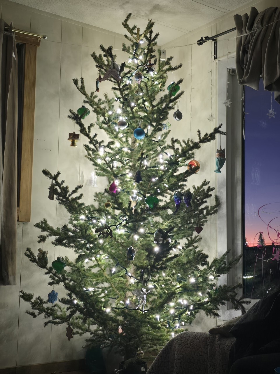 Quickly Decorated Tree for 2024 - We will not be home for Christmas this year, but definitely still wanted a tree at home! We only used some favourite ornaments this year as a quick fill. Always nice to have that glow of a Christmas tree. 