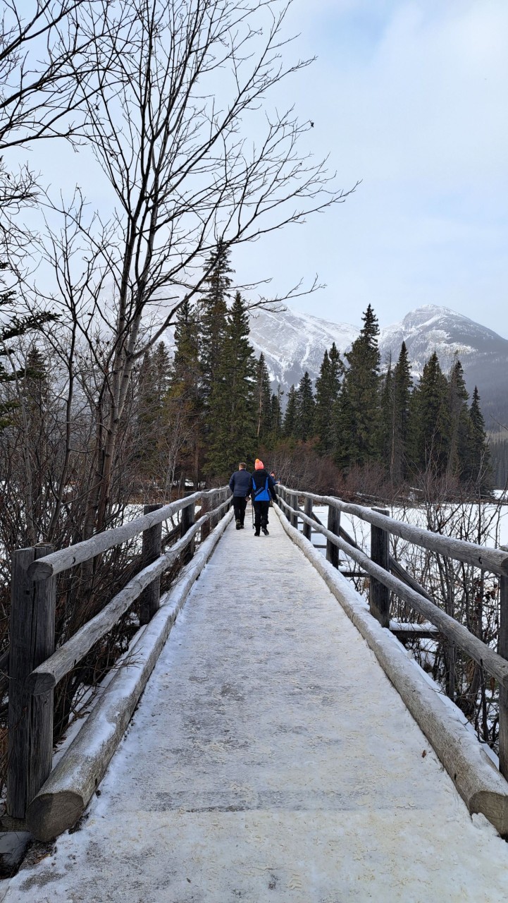 Pyramid Island Bridge Jasper Alberta - Pyramid Island is connected by a short pathway and a long bridge. It is such a beautiful place to visit and to just enjoy the moment. Pyramid Island Bridge is one of Jasper's iconic photo spots!