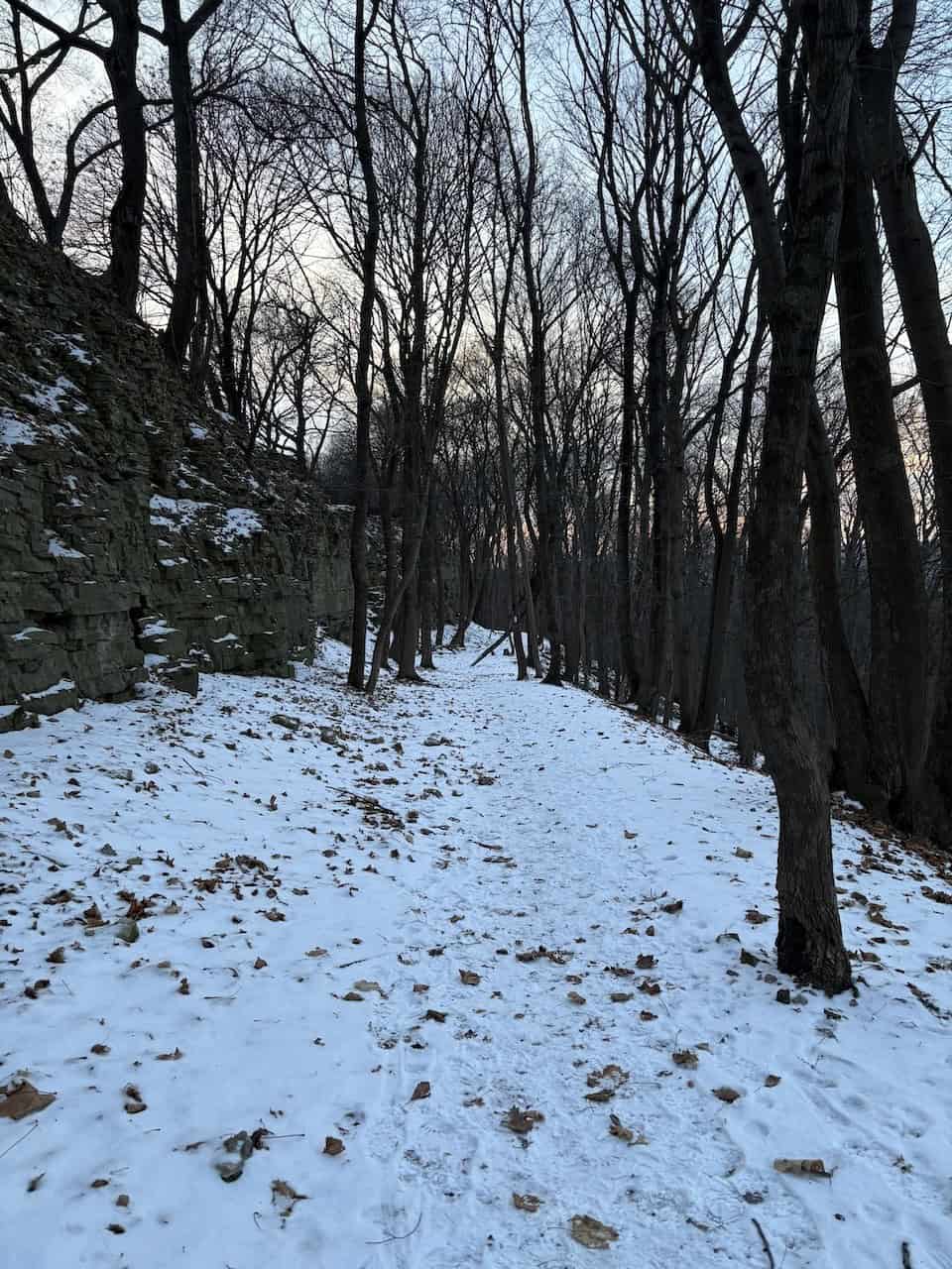 Bruce Trail Snowy Winter Walk Hamilton Ontario Canada - This well travelled path was rocky and rugged, but not slippery. This section of the Bruce Trail was the perfect spot for a winter walk in Hamilton, Ontario, Canada.