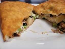 A famous Puffio with Pepperoni Mushrooms & Green Peppers at Sissio's Pizza Sarnia Ontario Canada 