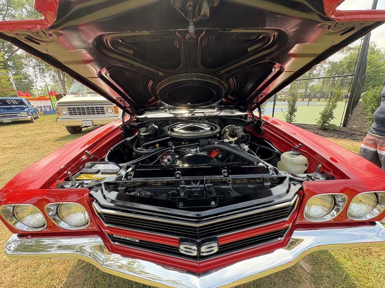 Under the Hood Summerfest Show and Shine - Many vehicles at the Show and Shine Car Show in Turkey Point, opened their hood showcasing the their immaculately kept, freshly shampooed engine.
