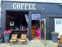The-garage-door-is-open-this-is-not-your-average-coffee-shop