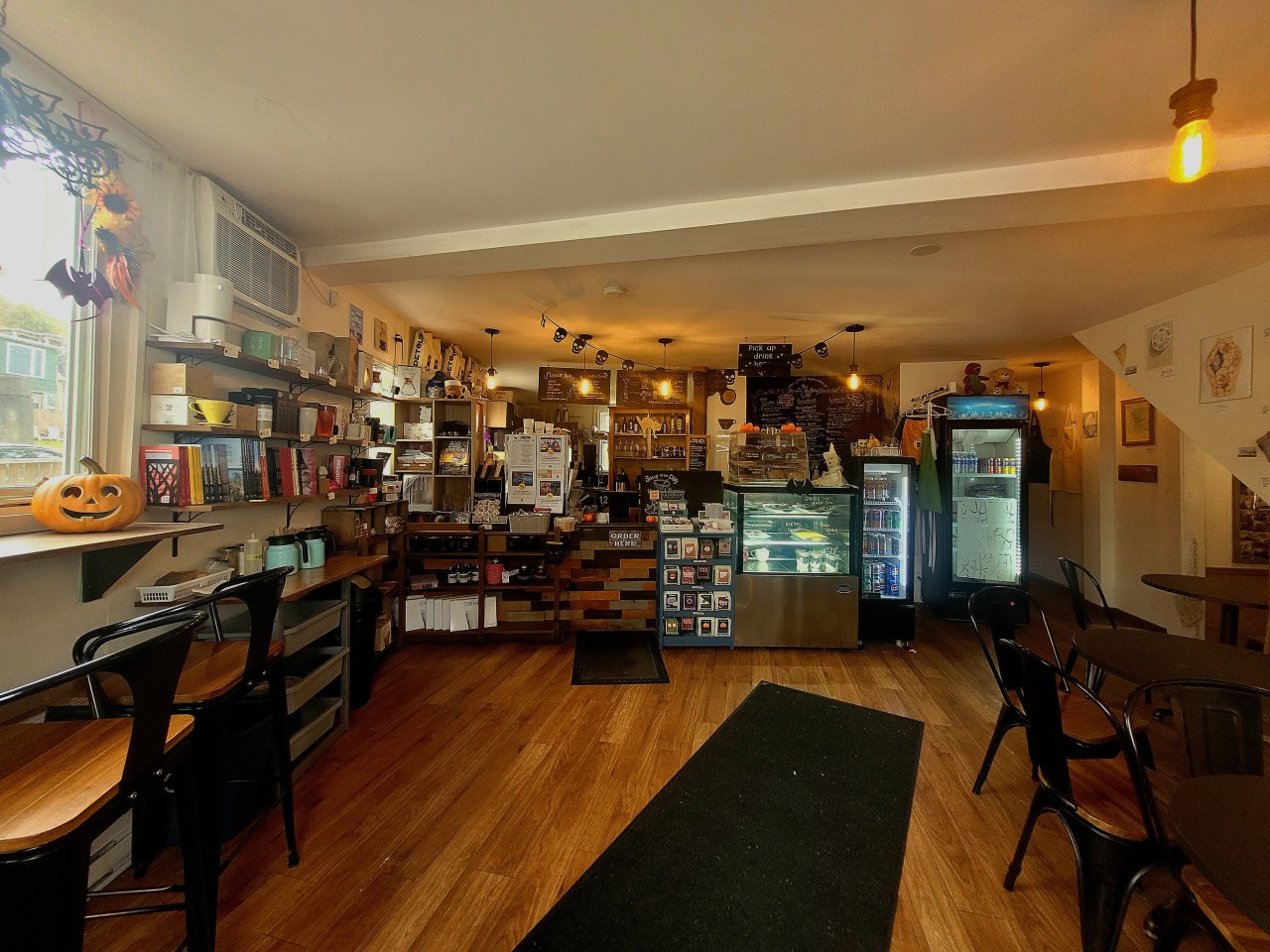 Rustic Nautical Charm at the Battery Cafe, St. John's, NL - The interior of The Battery Cafe, adorned with rustic, nautical-inspired decor that reflects St. John’s coastal heritage, offering a cozy atmosphere perfect for a relaxed meal or hot beverage.