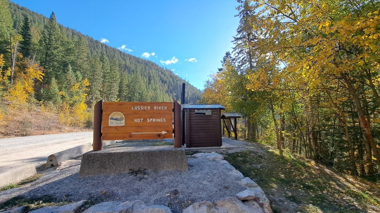 Lussier Hot Springs Entrance Sign – Whiteswan Lake Provincial Park BC - The entrance sign welcomes visitors near the start of Whiteswan Lake Provincial Park and marks the beginning of the short walk to the hot springs.