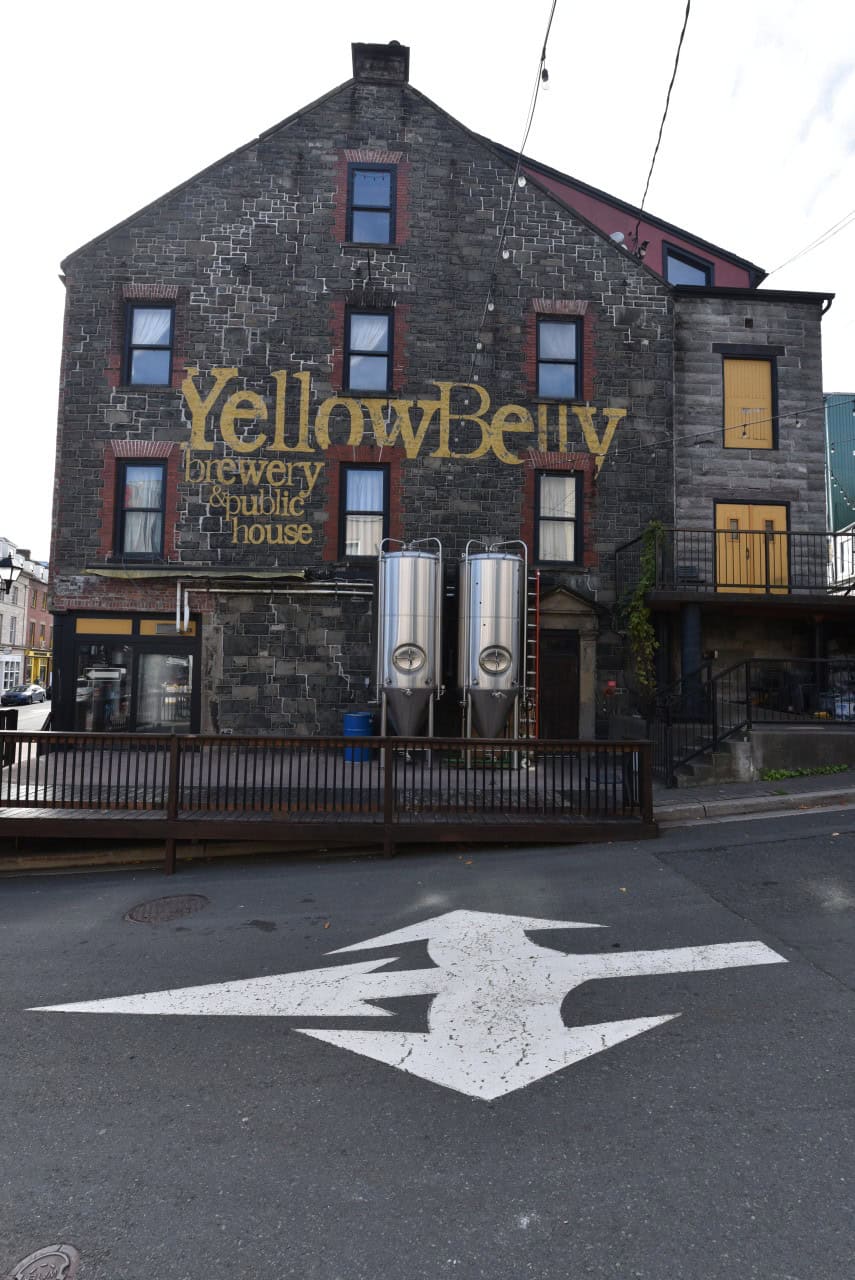 The Yellowbelly Brewery at the Vibrant Heart of St. John’s, NL - Situated at the corner of George St. and Water St., the Yellowbelly Brewery is nestled in the vibrant core of downtown St. John's, Newfoundland. The perfect stop for both locals and tourists to unwind.