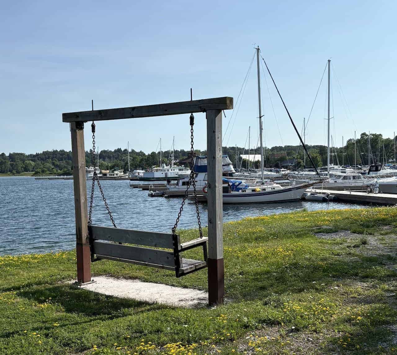 Marina-and-Boat-Dock-View - This seat swing provides a peaceful view of the boats docked at Gore Bay Marina on Manitoulin Island in Ontario, Canada. 