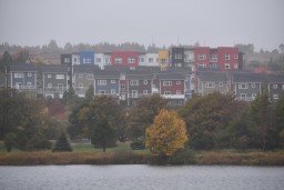 Brightly Coloured Homes Provide a Spot of Colour on Quidi Vidi Lake, St. John's, NL