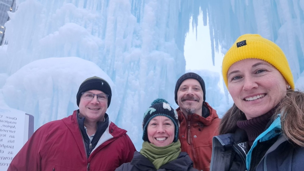 Friends Selfie at Edmonton Ice Castles a Winter Adventure in Alberta - Laughter and frozen textures create the perfect backdrop as friends capture a selfie inside the Edmonton Ice Castles. These moments highlight how shared experiences and playful exploration define Canadian winter travel adventures.
