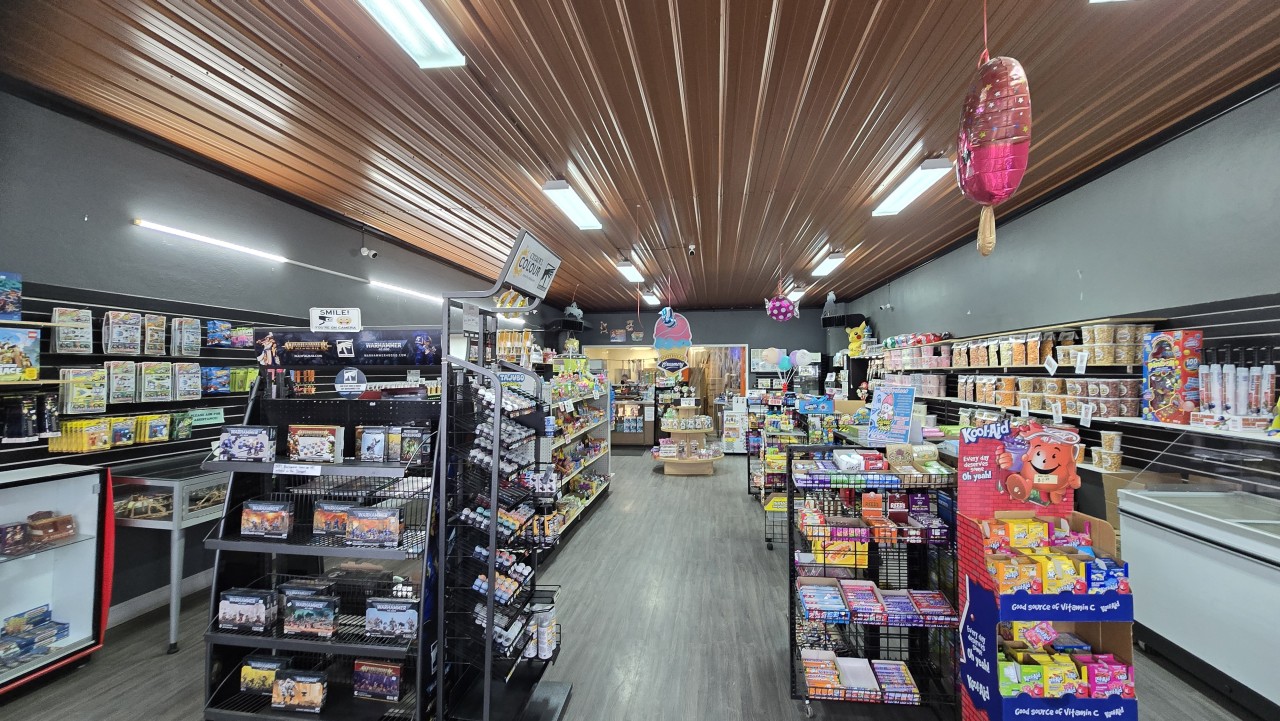 Inside Sweet Tooth Candy Shop Brooks AB - Step inside and it truly feels like a kid in a candy store, with colourful displays and shelves packed full of treats