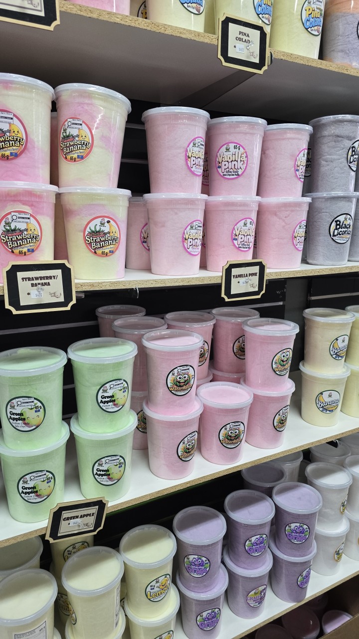 Cotton Candy Selection Brooks Alberta - Fluffy cotton candy in a rainbow of flavours lines the shelves at Sweet Tooth