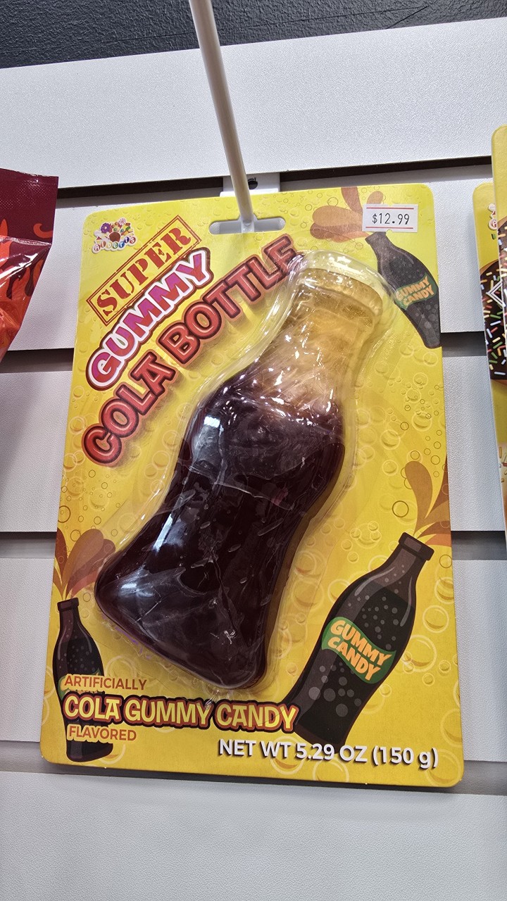 Giant Gummy Cola Bottle - A full-size gummy cola bottle? Why not. These oversized candies are half novelty, half challenge, and all fun.