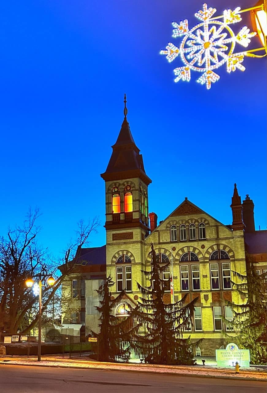 Winter Festival of Lights Display - Perth County Courthouse Tower of Light - the prominent tower has been transformed into a colourful beacon using remotely controlled professional lighting from within